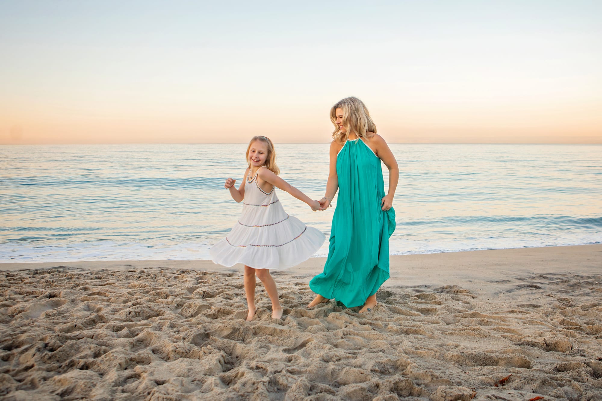 San Diego Beach Photographer with mom and daughter at sunrise