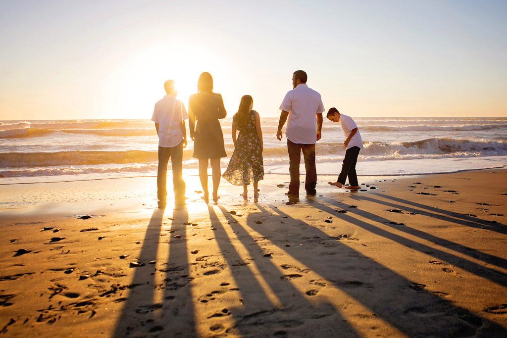 Lifestyle family sunset beach photos in Carlsbad.