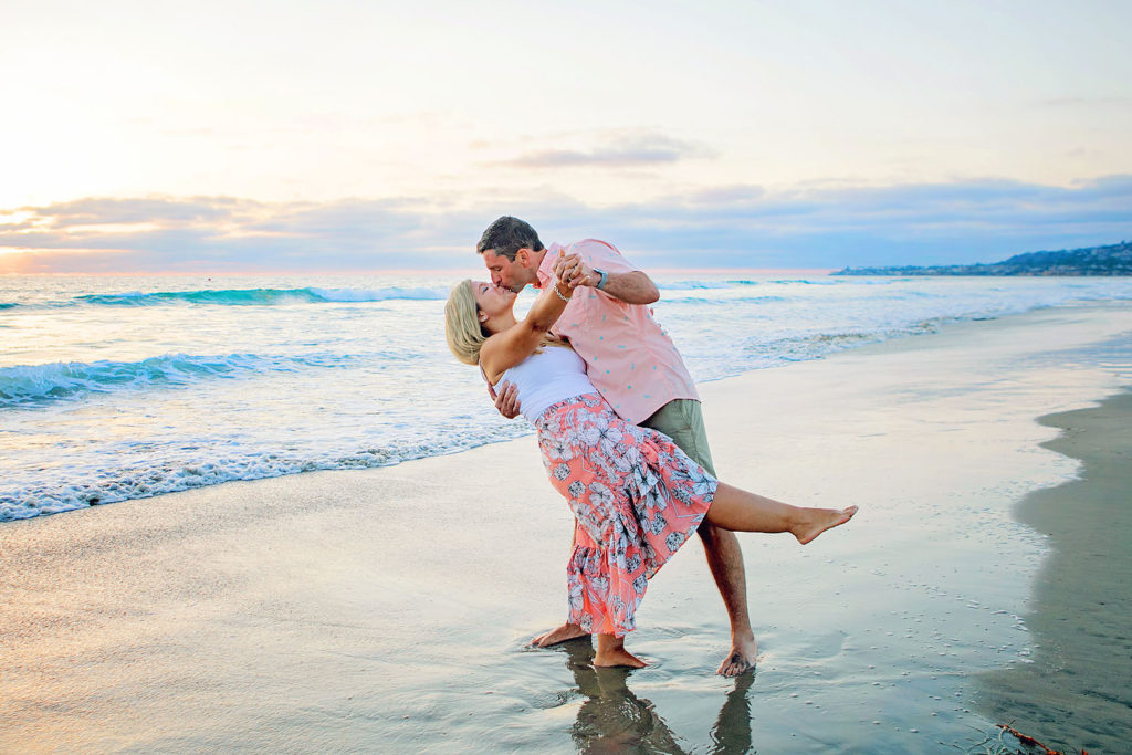 Photography by San diego Beach photographer. Photo is of 2 people standing outdoors. 