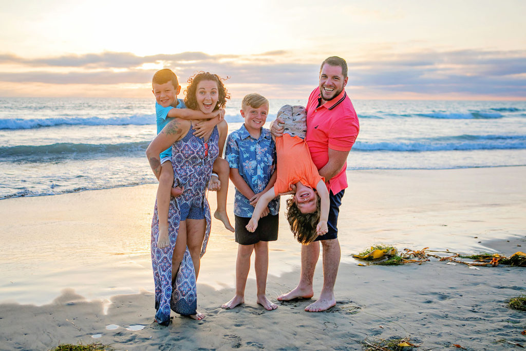  Photography by Extended family Beach photographer. Photo is of 5 people standing outdoors. 
