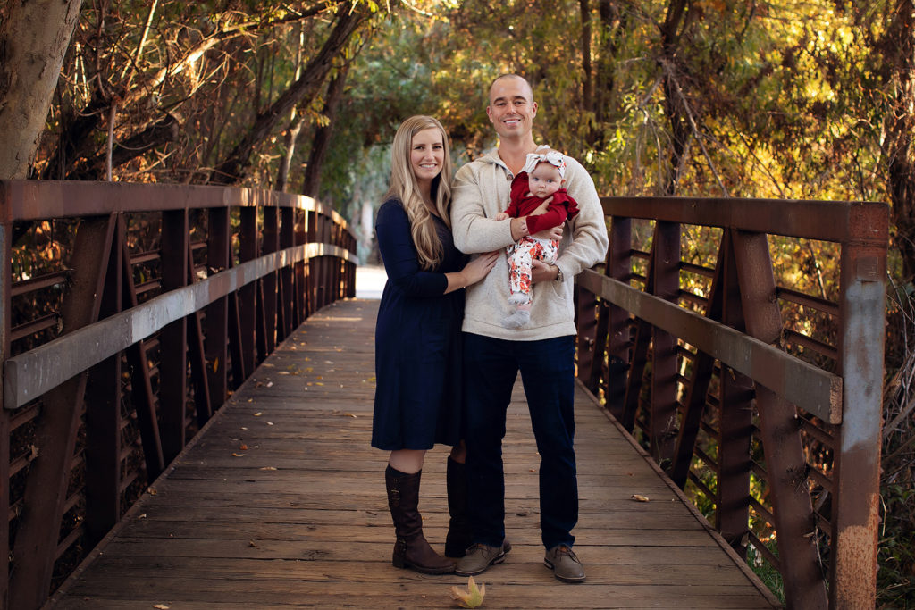 Photo of Family on bridge for their Portrait Session