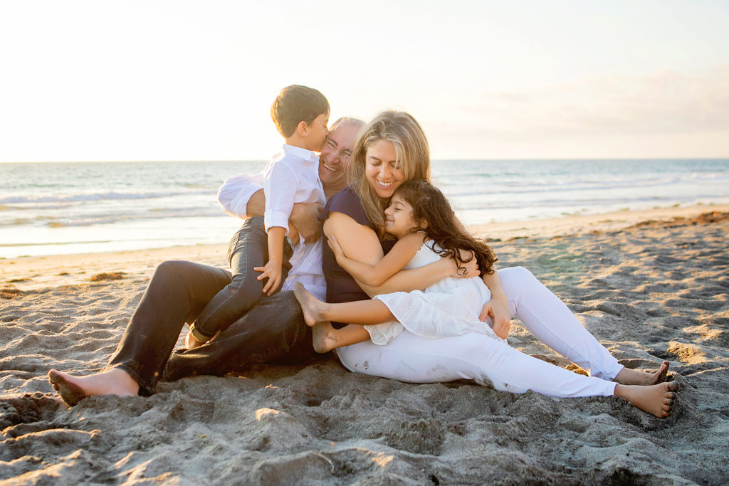 Family portrait for their photo session on Carlsbad Beach with Kristin Rachelle Photography