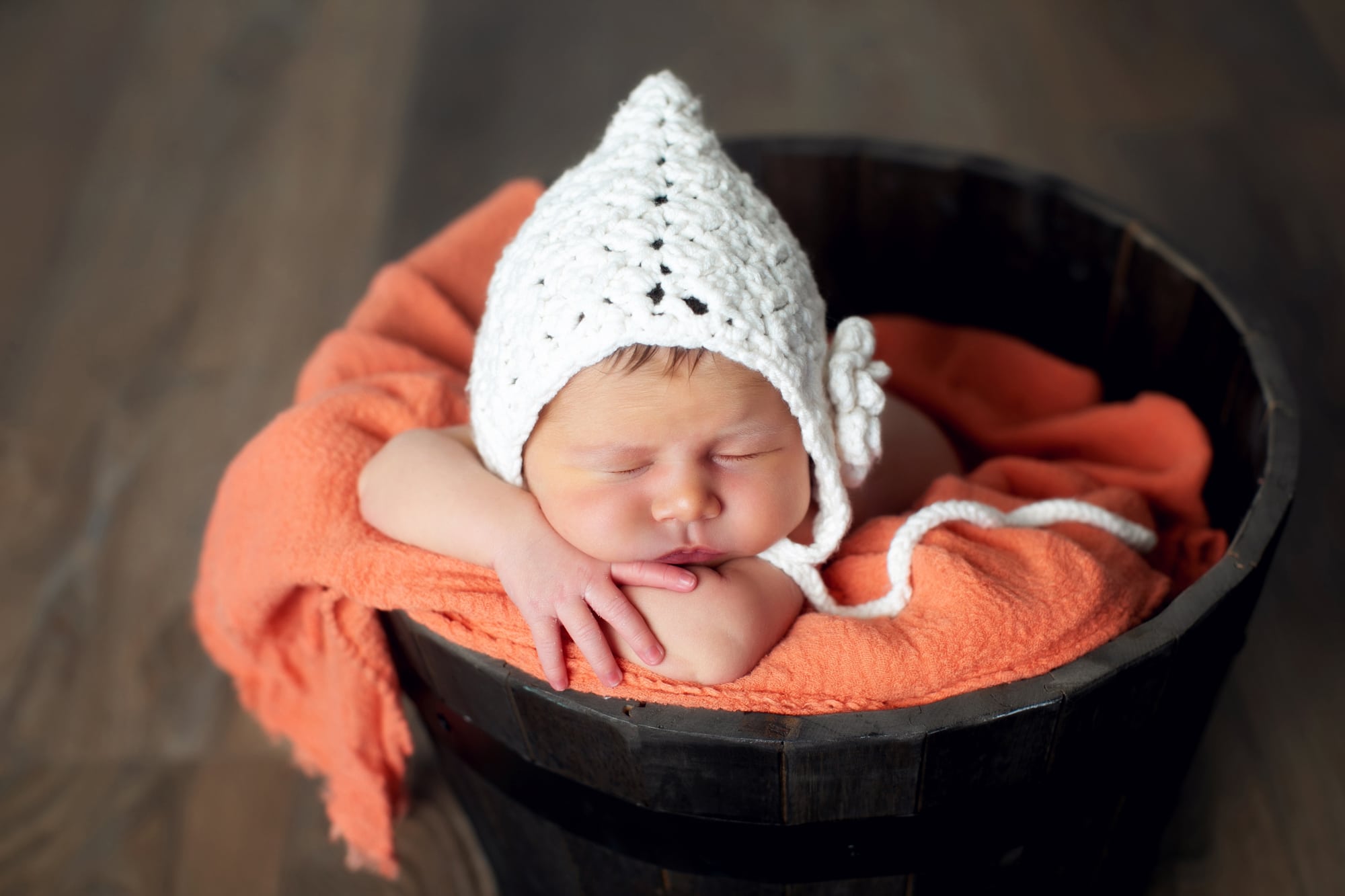 Infant Girl Smiling for Newborn Photographers in Escondido