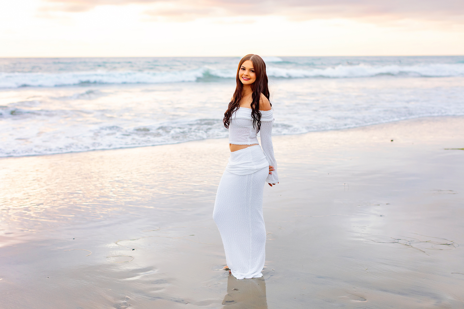 North County San Diego Senior Photography of girl on beach at sunset in white dress