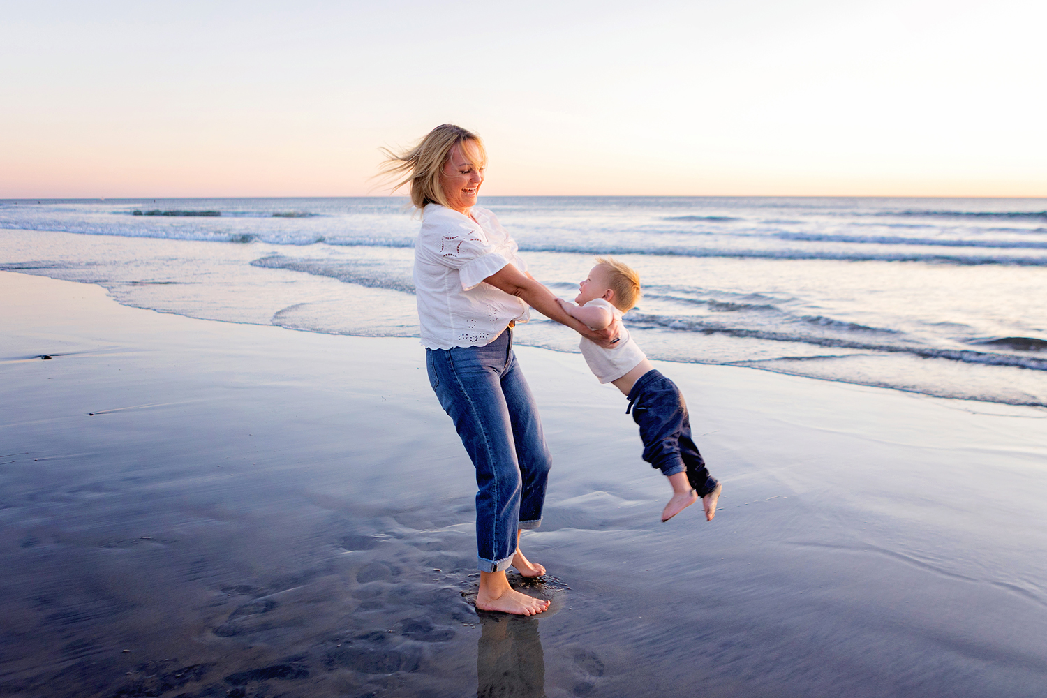 Candid Family photos at Carlsbad Beach in San Diego